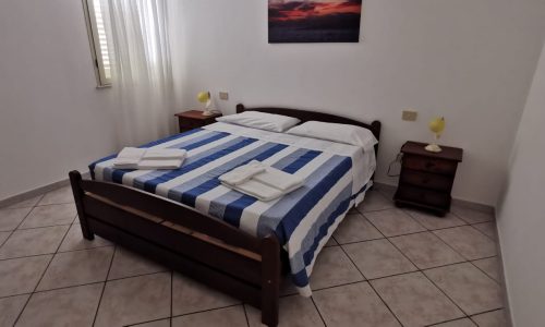 Camera Trilocale